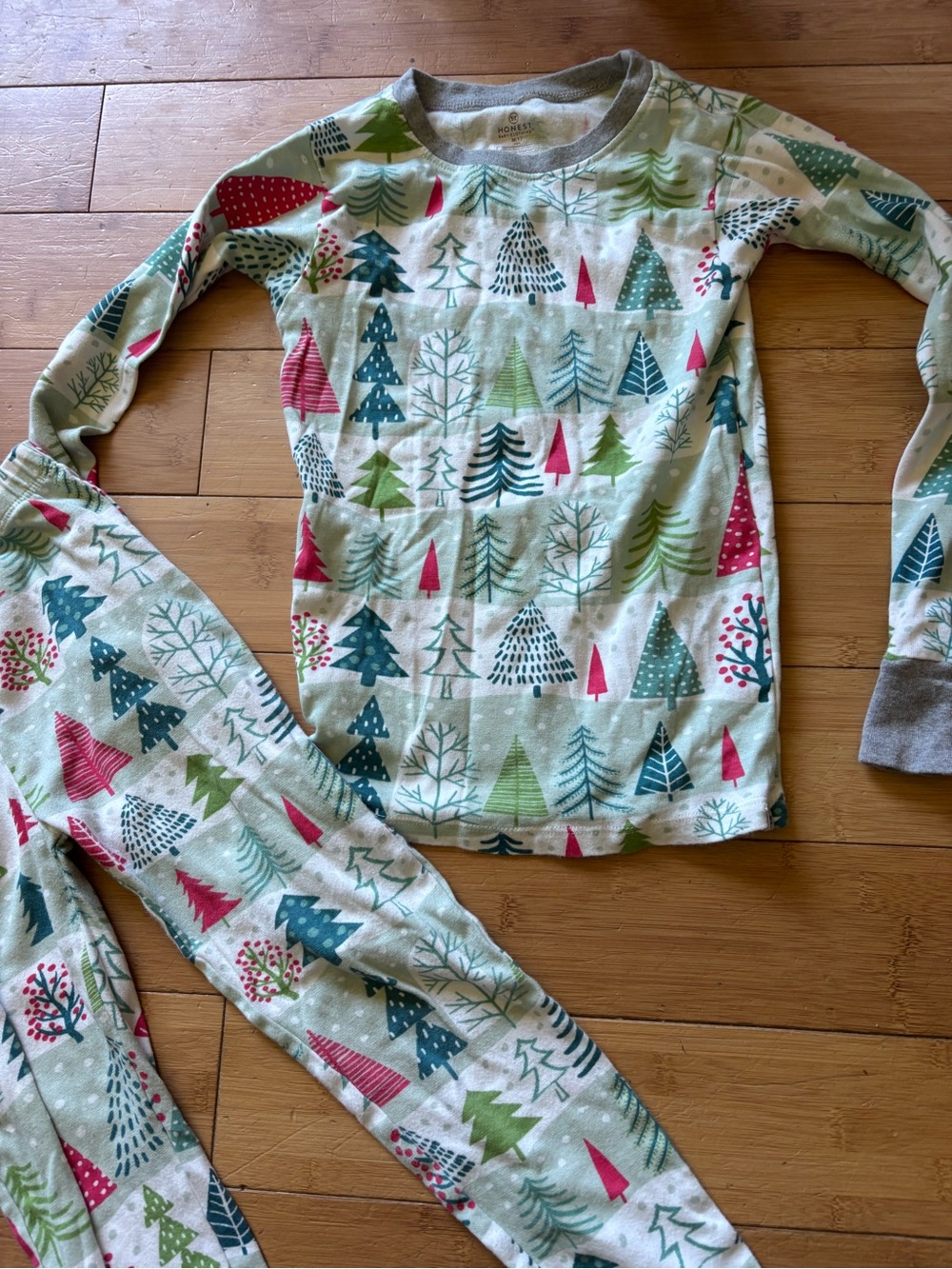 Honest Kids Green Holiday Tree Pajama Set. long-sleeve top and matching pants.